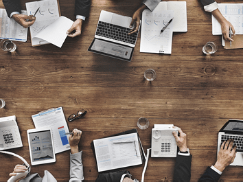 Business People Analyzing Statistics Financial Concept